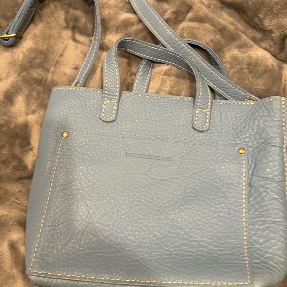 Portland leather mini crossbody purse. Blue color with zip top. Never used.